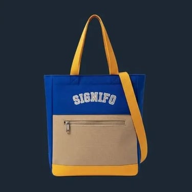 Tote bag SIGNIFO tema kemewahan dunia lama dari kanvas biru benhur, cream, dan kuning tua.