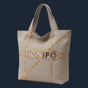Tas tote SIGNIFO warna Khaky dengan desain bordir emas 'Kintsugi' yang artistik dan elegan.