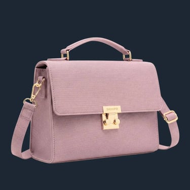 Tas satchel berwarna dusty rose mauve dengan gagang atas dan kuncian emas di latar belakang putih.