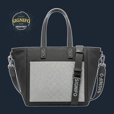 "A highly structured, geometric tote with a rigid, boxy form and sharp, defined corners.