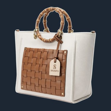 A structured, open-top 'shopper' tote with a wide, stable base.