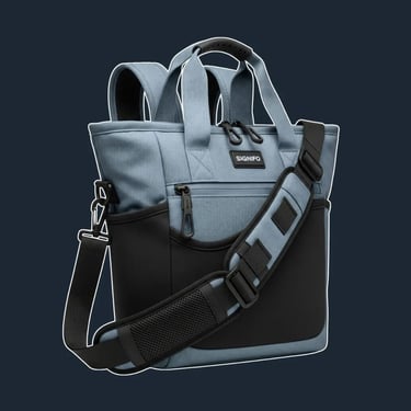 A sleek, ergonomic, and body-hugging tote with a secure zip-top and multiple, purpose-built compartments for tech.