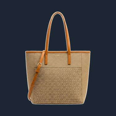 A perfectly proportioned, minimalist tote with a clean, rectangular silhouette and an invisible magnetic closure. The focus i