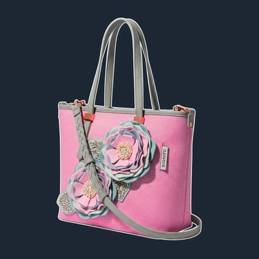 A simple, elegant, and structured tote with a clean, vertical silhouette, designed to act as a canvas for artistry.