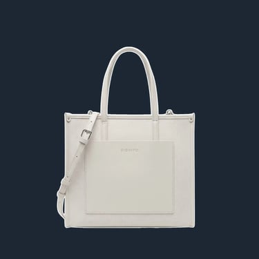 A minimalist, structured tote with a clean rectangular form and an 'invisible' construction with minimal seams. The hard-fini