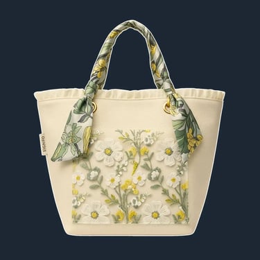 A charming, medium-sized tote with a slightly flared 'A-line' silhouette and a ruffled or pleated top edge.