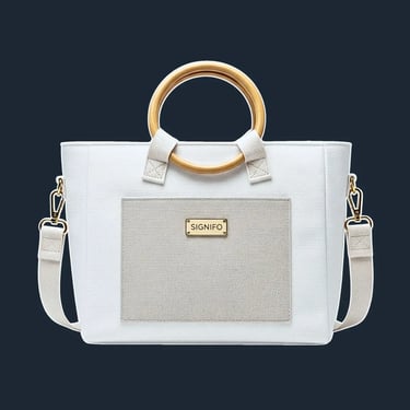 A minimalist, rectangular tote with a soft, yet stable structure and clean, folded corners.
