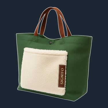 A large, soft, and unstructured 'shopper' tote with a simple, open-top silhouette that feels cozy and inviting.