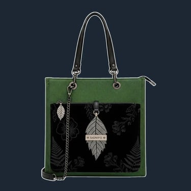 An elegant, structured tote with a clean, vertical silhouette and a secure zip-top, perfect for an evening out.