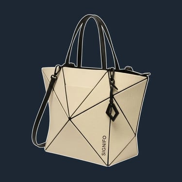 A highly structured tote with a unique, geometric folded construction that creates sharp, origami-like pleats and angles