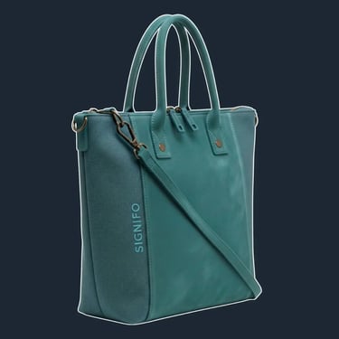 A sleek, minimalist tote with a clean, vertical silhouette and a zip top.