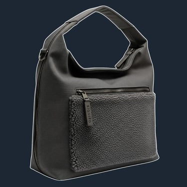 A large, slouchy, and unstructured hobo-style tote that drapes and folds.