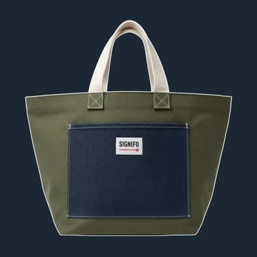 A very simple, almost rustic, open-top tote with a wide, stable base and clean, folded construction.