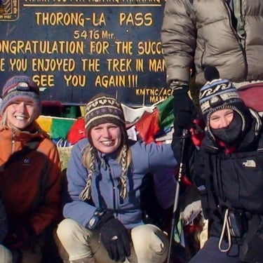 headshot of three trekkers in nepal