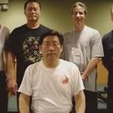 Earth and Wood instructor with tai chi masters Ren Guangyi and Chen Xiao Wand