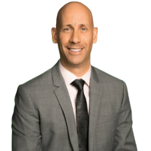 a man in a suit and tie smiling