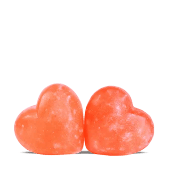 Heart-shaped pink Himalayan bath salt pieces, customized spa bath salt product.