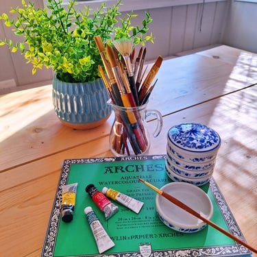 Paintbrushes and paint used for art