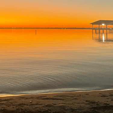 Sebring City Pier on the lake Jackson with a sunset view
