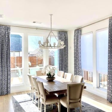 Custom French Pleated Drapery fully operational.  Trend designer fabric custom hardware
