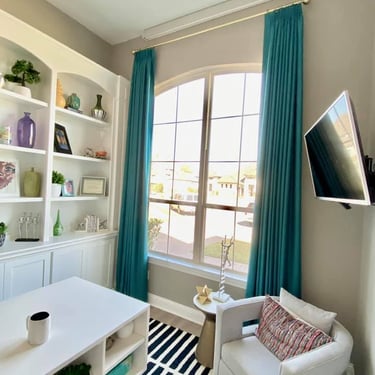 Custom Teal French Pleated Drapery panels Kasmir Fabricfully operational on custom hardware