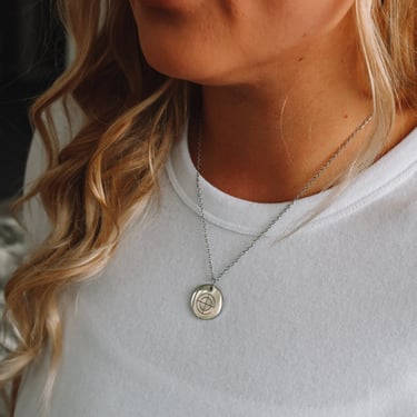 necklace with loved logo engraved