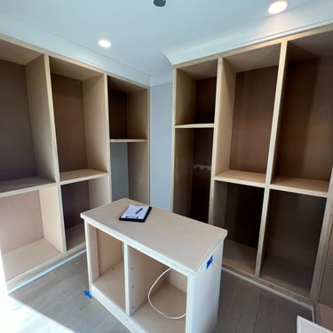 Custom white closet refinishing in Phoenix, transforming storage spaces with a sleek and professional finish.