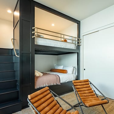 Custom-painted bunk bed with a flawless sprayed finish, enhancing the room with a sleek and even coat.
