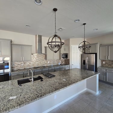 Updated kitchen with professionally refinished gray cabinets in Phoenix, enhancing the space with a modern and stylish finish
