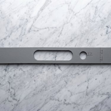 Custom faucet mat with a radius cut out and accessory hole.