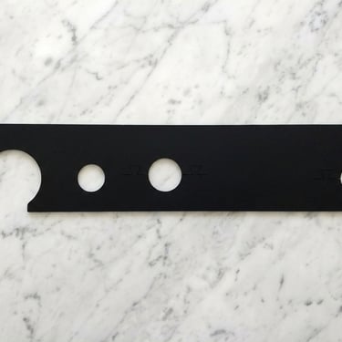 Custom mat with a Delta glass rinser cut out.