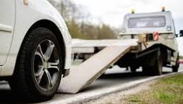 carro sendo guinchado, defesa jurídica ação de busca e apreensão de veículo.