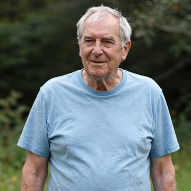 man standing near balcony