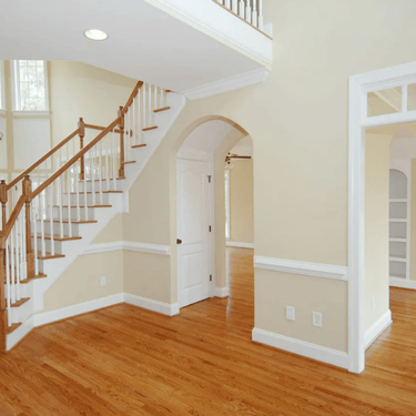 Wood staircase area, entrance and hardwood floors.