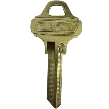 SpareFob locksmith cutting a new house key for a Toronto customer