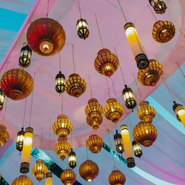 Wedding decoration with ceiling lanterns creating a warm and elegant ambiance