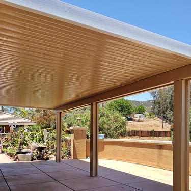 Latte colored Alumawood patio roof over looking hills of Ramona, CA.