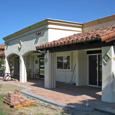 Amazing Spanish style patio and roof structures constructed around 1973 mobile home.