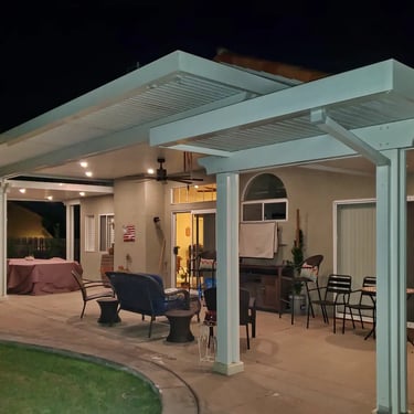 Patio cover with lighting at night.