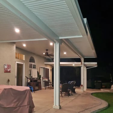 Large multi level Alumawood cover at night.
