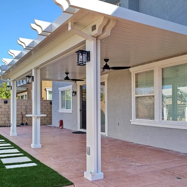 White patio cover with lights and AlumaTable.