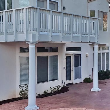 Wood balcony with wood handrail in Murrieta, CA.