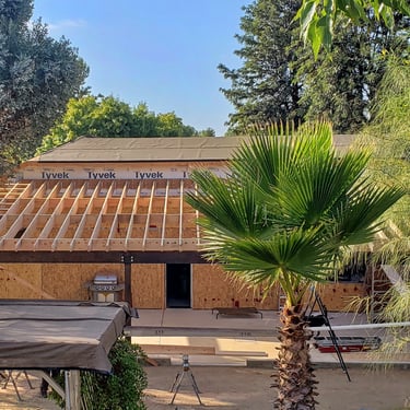 Rafters and blocking for sloped shade structure on ranch style home in Menifee, CA.