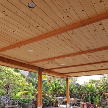 Wood roof structure with beams and T & G ceiling in Escondido, California.