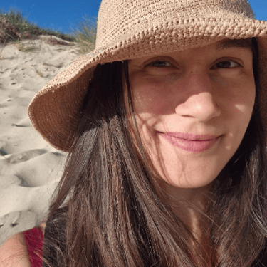 Megan Sydney sacred weekend participant smiling in hat
