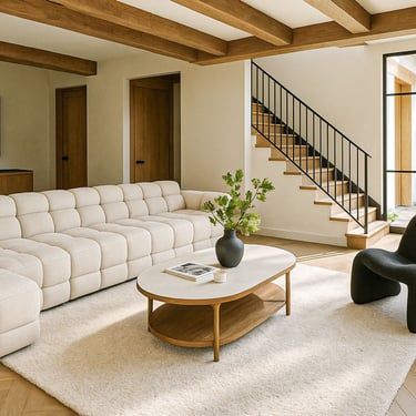 Scandinavian-inspired living room with custom cube sofa, wood beams, natural light, and modern accents by Solo Home Decor.