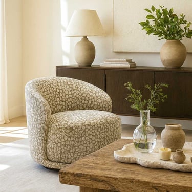 Swivel accent chair with textured fabric pattern in a luxury living room by Solo Home Decor