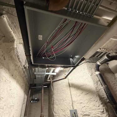 Electrical panel wiring and conduit installation overhead in Reading PA