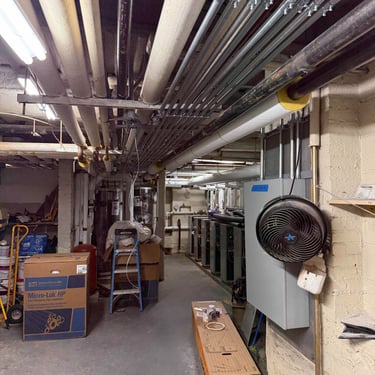 Commercial mechanical room with electrical and piping systems in Reading PA