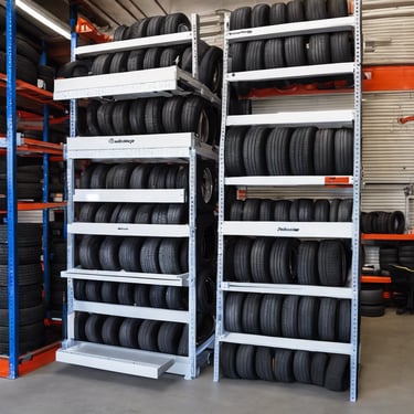 man in white dress shirt holding yellow and black power tool